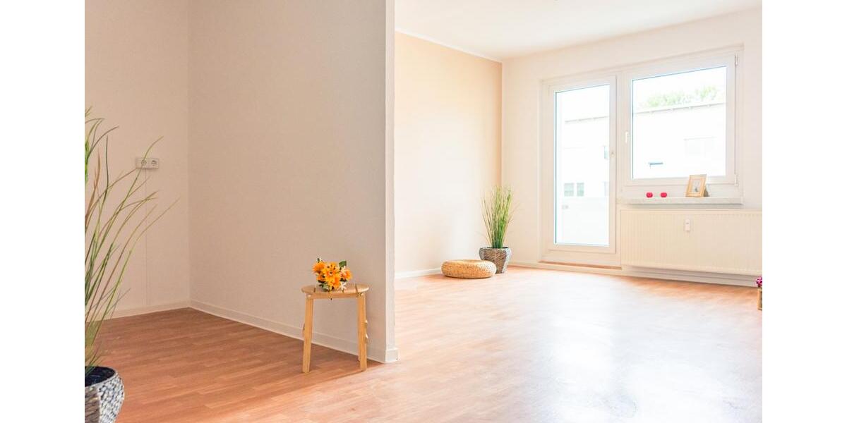 Hier lädt ein offener Wohn-Essbereich zum Wohlfühlen ein 3 zimmer