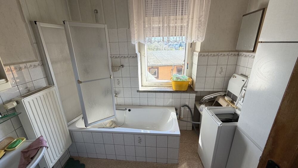 Wohnen und Arbeiten unter einem Dach – Renditestarkes Stadthaus in Geringswalde - Mehrfamilienhaus, Wohnhaus Geringswalde | Angebot:26943688