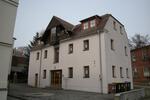 freistehendes, zweigeschossiges Wohn- und Geschäftshaus