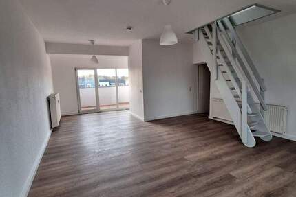 Lichtdurchflutete Maisonettwohnung mit Dachterrasse 2 zimmer