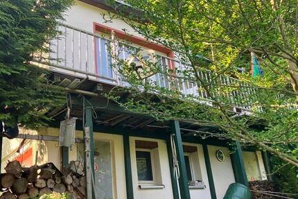 Massiv gebautes Ferienhäuschen mit Kamin und wunderbarer Aussicht auf eigenem Grundstück zimmer