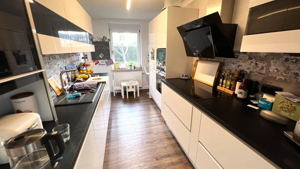 Lebensfreude pur – stilvolles Einfamilienhaus mit Einliegerwohnung und Sonnenterrasse 6 zimmer