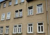 Sanierungsbedürftiges Mehrfamilienhaus