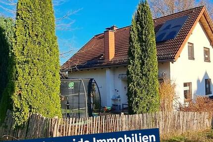 Lebensfreude pur – stilvolles Einfamilienhaus mit Einliegerwohnung und Sonnenterrasse 6 zimmer